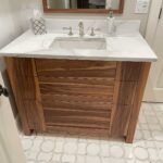 Calacatta Lincoln marble vanity top with Haylo water jet mosaic