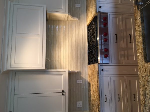 Granite Countertops with Glass Backsplash