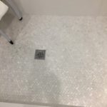 mother-of-pearl-herringbone-mosaic-shower-floor