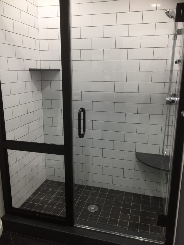 White Crackle Subway Tile with Belgian Bluestone Tile Floor