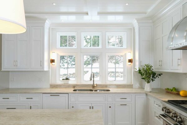 Taj Mahal quartzite Countertops with Glassos Herringbone backsplash