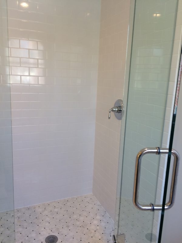 White Gloss Subway Tile and Jasmine Mosaic Shower Floor